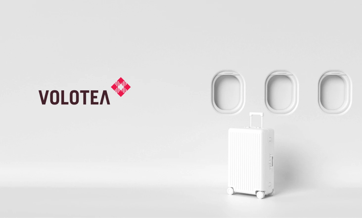 Ventanas de avión, maleta de viaje y logo de Volotea